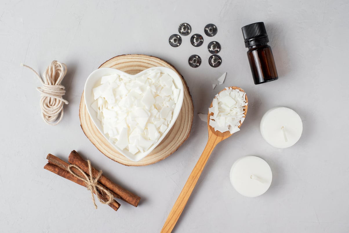 Basic set for home-made natural white eco soy wax candles in glass, wick, perfume. Idea for a hobby, business. Making trendy diy candles without harm to health on white background.